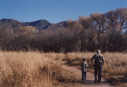 Sean and Don walking in a field